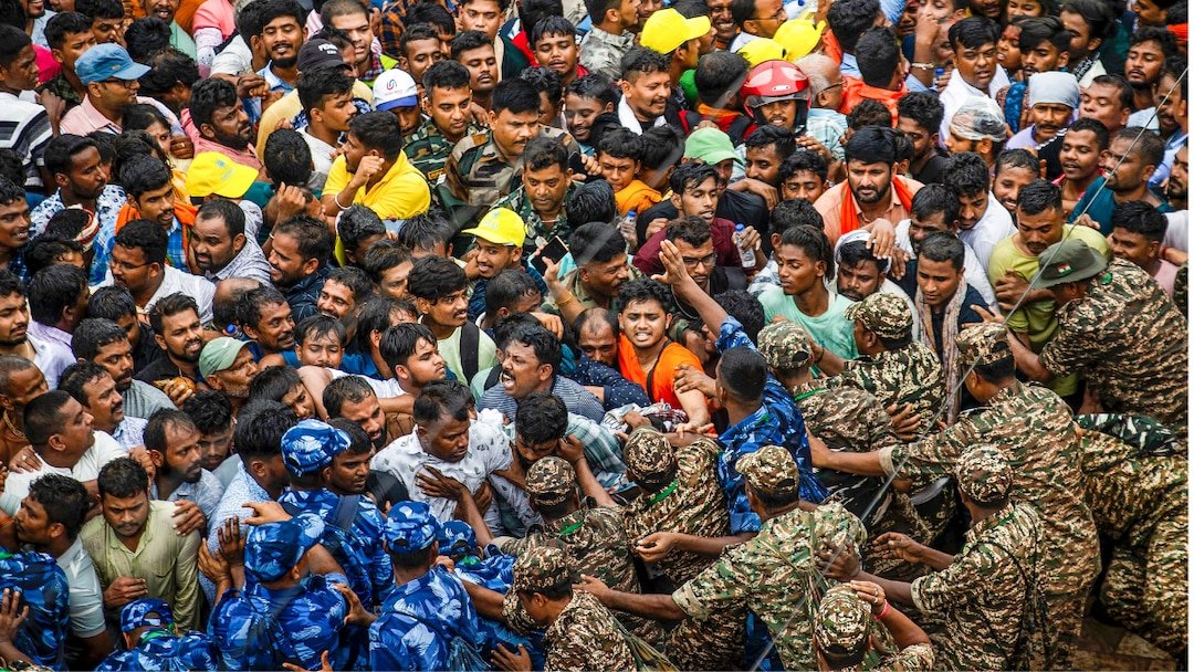 security personnel manage the crowd during the annual rath yatra festival at the jagannath temple in puri odisha